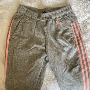 Light gray and pink adidas joggers